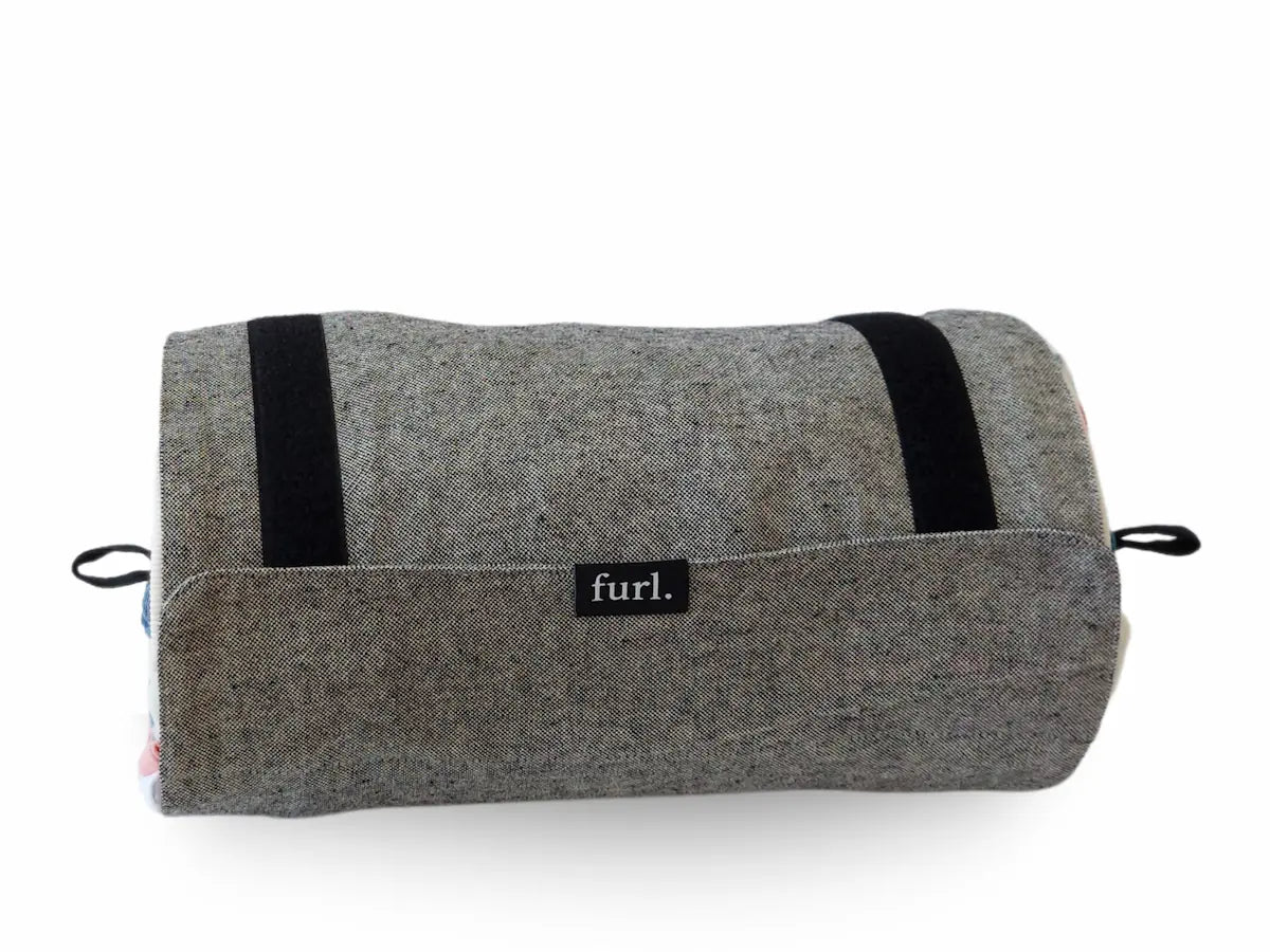 After: same clothes rolled into a compact Furl